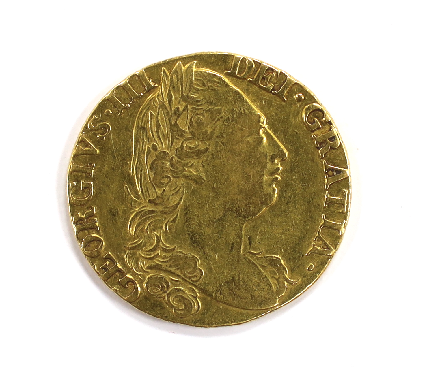 British gold coins - A George III gold guinea, 1779, fourth head, VF, (S3728), Provenance - bought from Richard Lobel and co, London, 7th March 1977 for £170.